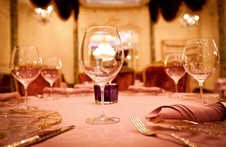 Empty glasses set in restaurantの写真素材