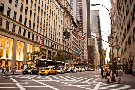 NEW YORK - AUGUST 21: Yellow taxis rides on 5th Avenue on August 21 2012 in New York, USA. 5th...