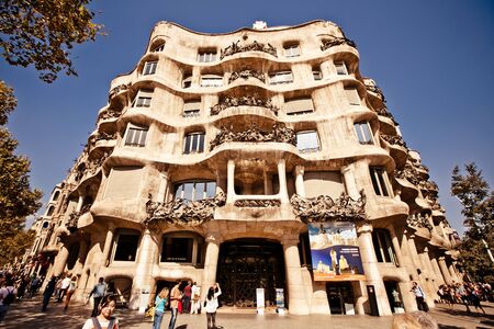 BARCELONA, SPAIN - OCTOBER 4: Casa Mila or La Pedrera on October 4, 2012 in Barcelona, Spain. This famous building was designed by Antoni Gaudi and is one of the most visited of the city.のeditorial素材