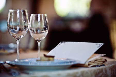 Empty glasses set in restaurantの写真素材