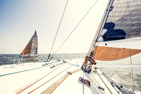 Sailing ship yachts with white sails in a rowのeditorial素材