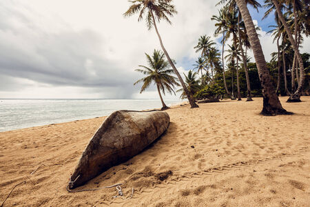 Old boat on beach , Dominican Republicの写真素材