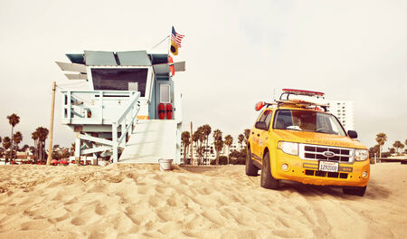 LOS ANGELES, USA - JULY 24: Lifeguard tower on Santa Monica State Beach on July 24, 2012 in Santa Monica, California. Santa Monica has 3.5 miles of well-maintained California beach locations and enjoys on average 340 days of sunshineのeditorial素材