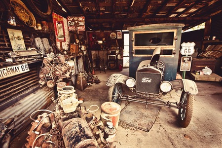 HACKBERRY - AUGUST 3: Hackberry General Store with a 1957 red Corvette car in front on August 3, 2012 in Hackberry , Arizona, USA. Hackberry General Store is a popular museum of old Route 66のeditorial素材