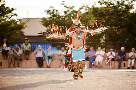 GALLUP , NEW MEXICO - AUGUST 04, 2013 : Native Americans with traditional costume participates at the annual Inter-tribal ceremonial night parade on August 04, 2013 in Gallup, New-Mexico, USAのeditorial素材