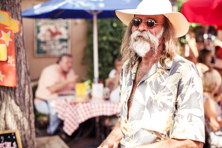 NEW MEXICO, USA - AUGUST 5, 2013: Old man in hat and sunglasses in Santa Fe on August 5, 2013, New Mexico, USAのeditorial素材