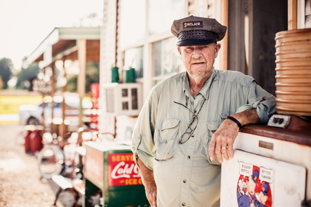 ILLINOIS, USA - AUGUST 7, 2013: Man on the gas station in Illinois on August 7, 2013, USAのeditorial素材
