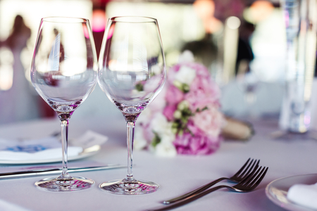 Empty glasses in restaurantの写真素材