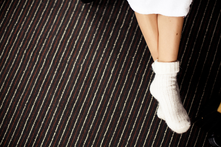 Legs in knitted socks