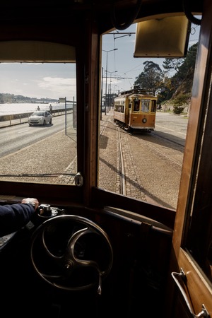 PORTO, PORTUGAL - OCTOBER 19, 2015: Famous old tram on street of Porto. Trams operating in Porto...