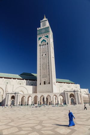 CASABLANCA, MOROCCO - NOVEMBER 3, 2015: Unidentified woman walks near Hassan II Mosque in Casablanca, Morocco.のeditorial素材