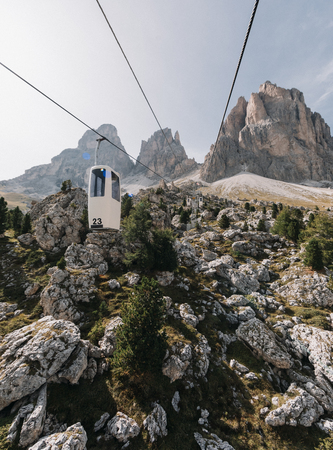 Cable road at Sella Pass in Dolomites mountains during daytime, South Tyrol, Italyの写真素材