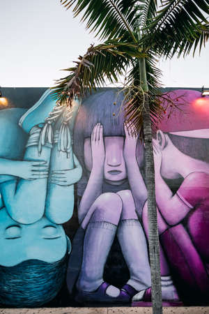 Graffiti art on wall in graffiti design district Wynwood in Miami, Florida.のeditorial素材