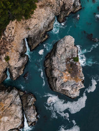 Aerial view of McWay Falls on the coast of Californiaの写真素材