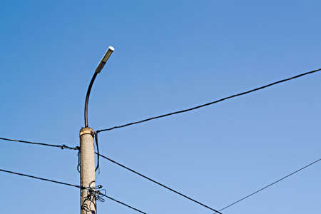 Lantern electronics wires on sky background