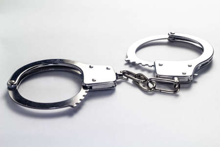 handcuffs on a white background isolateの写真素材