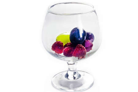 Glass with berries on a white background isolateの写真素材