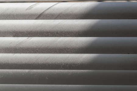 Dirty white blinds in the dust