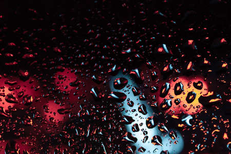 glass with drops car glass in the rain oneの写真素材