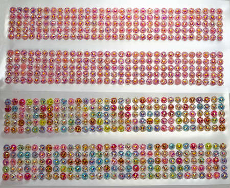 multi-colored rhinestones background. copy spaceの写真素材