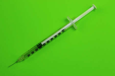 An insulin syringe with a marking, drugs on a plain background. copy spaceの写真素材