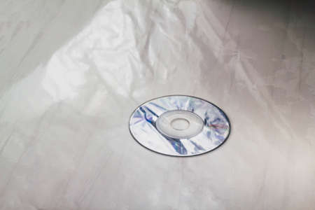 Small CD drive on marble background