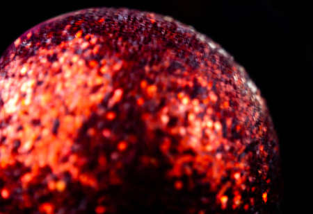 blurred bokeh christmas ball on black backgroundの写真素材