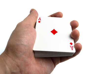 Ace diamond card deck from above in hand on isolate white background
