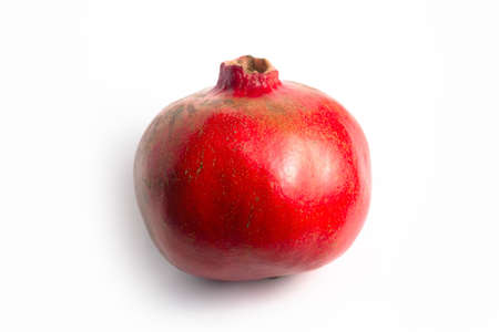 Red ripe pomegranate on a white background isolateの写真素材