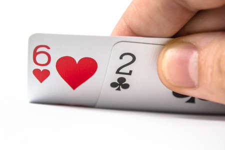 Six and two bad poker card on isolate white backgroundの写真素材