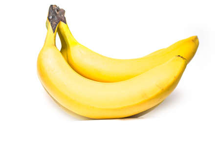 Bunch of ripe yellow bananas on a white background isolateの写真素材