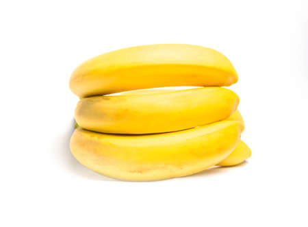 Bunch of ripe yellow bananas on a white background isolateの写真素材