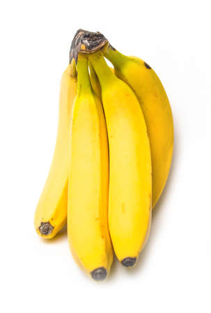 Bunch of ripe yellow bananas on a white background isolateの写真素材