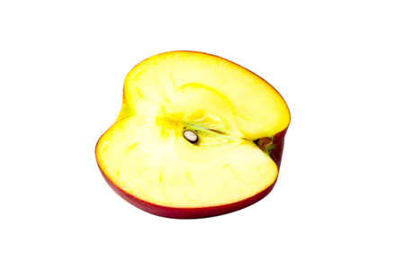 red apple cut in half on a white backgroundの写真素材