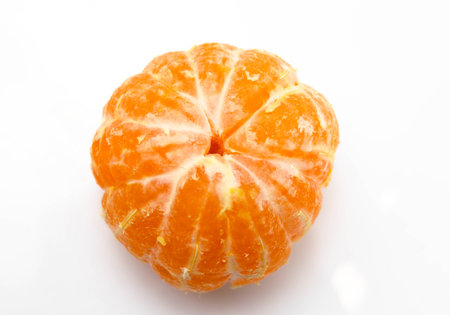 Orange mandarin peeled on a white backgroundの写真素材