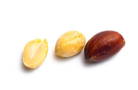 Peanuts on a white background. close up
