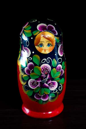 painted nesting doll on a dark backgroundの写真素材