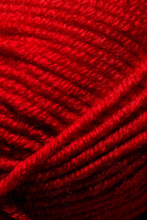 Red skein of thread for knitting. macroの写真素材