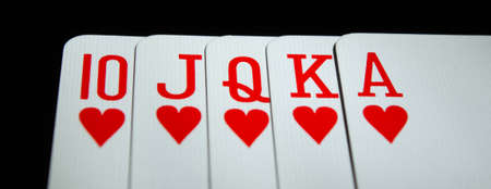 Hearts Royal Flush Poker on black copy space background. close upの写真素材