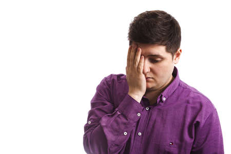 fat man in purple tiredness longing on white background copy space isolateの写真素材