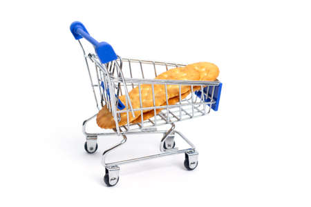 shopping cart with crackers on a white background. isolateの写真素材