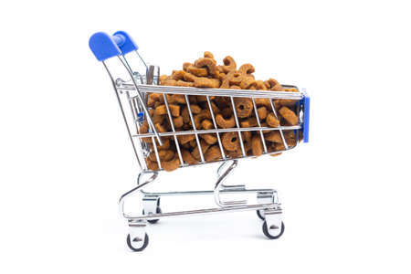 shopping cart with food for animals, dogs, cats on a white background. isolateの写真素材