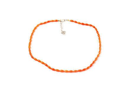 natural coral beads on a white background isolateの写真素材