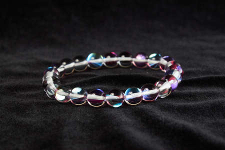 opal glass bracelet semi-precious stone on black velor. close upの写真素材