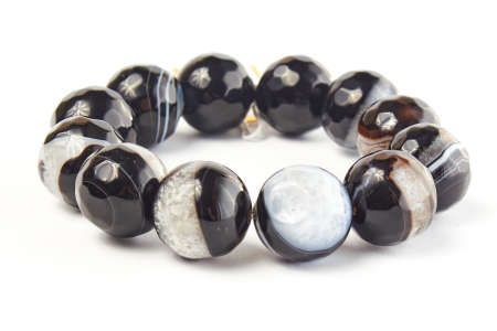 semiprecious agate bracelet on a white background. close upの写真素材