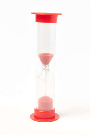 red hourglass on a white background isolate
