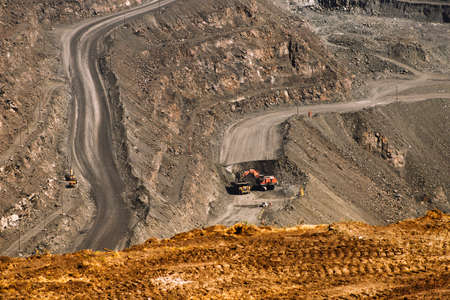 iron ore quarry excavator and dump truck Mining industry, Mining and quarrying equipment, general...