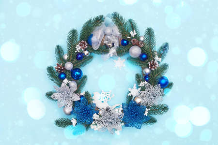 christmas wreath on a blue background, flatley, copyspace