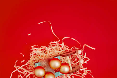 Christmas composition, gifts on red background, copyspaceの写真素材