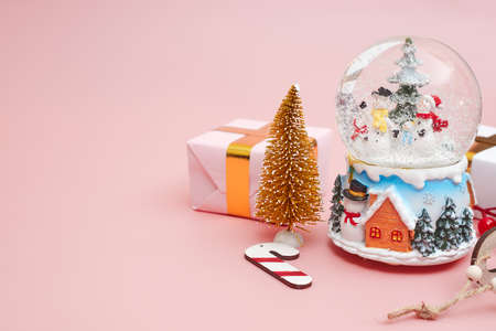 Christmas composition, gifts on pastel pink background, copyspaceの写真素材